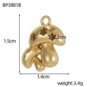 Detailed view of mushroom-shaped gold pendant with star cutouts and size measurements