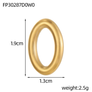 Macro shot of a matte gold oval jewelry link showing dimensions 1.9cm by 1.3cm