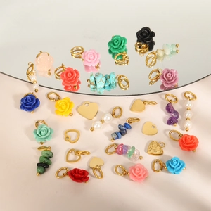 Elegant rose and heart charms with colorful resin flowers and golden rings for DIY jewelry