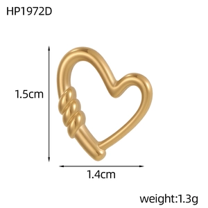 Macro shot of 18k gold plated heart pendant with twisted texture and dimensions 1.5x1.4cm