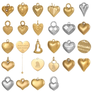 Polished heart pendants in gold and silver finish with custom engraved patterns