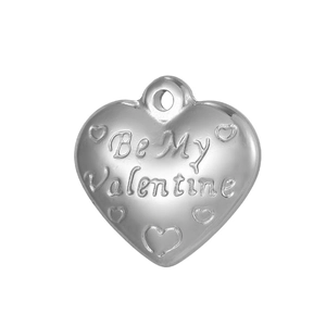 Detailed view of silver heart pendant engraved with Be My Valentine for DIY jewelry