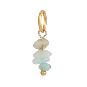 Close-up of bohemian blue natural stone and gold pendant with artistic beaded detail