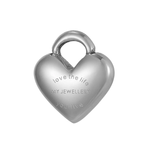 Detailed macro of heart-shaped stainless steel pendant with Love the Life engraving