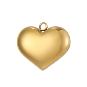 Close-up of polished golden stainless steel heart-shaped pendant with a shiny mirror finish