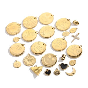 Assorted gold engraved pendants in round, heart, and moon shapes for DIY jewelry making