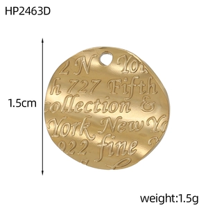 Macro view of a 1.5cm golden stainless steel heart pendant with wavy texture and engraving
