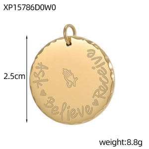 Detailed macro view of 2.5cm gold coin pendant with laser engraved motivational quote