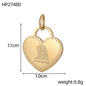 Detail of heart-shaped gold-plated stainless steel pendant with Virgin Mary engraving