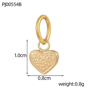 Detailed size view of gold heart pendant with textured surface 1.0cm by 0.8cm dimensions