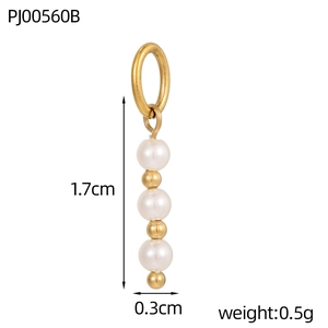 Detail view of 1.7cm beaded pendant featuring white faux pearls and gold metal beads