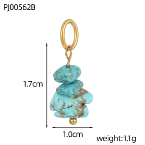Detail of bohemian turquoise stone pendant with gold ring and layered natural mineral texture