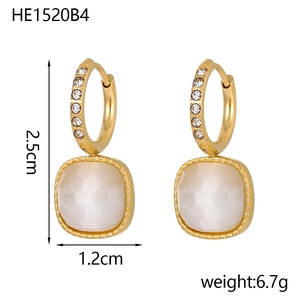 Detailed size view of square geometric gold hoop earrings with white zircon and cat's eye stone