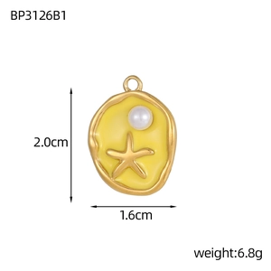 Detail view of gold starfish pendant with yellow enamel inlay and pearl accent