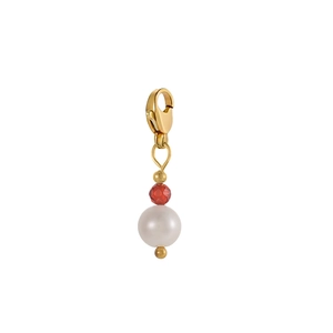 Golden pendant earring with red faceted bead and white pearl on a clean white background