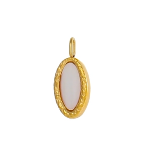 Detail of vintage oval shell pendant with hammered gold metal frame for DIY jewelry