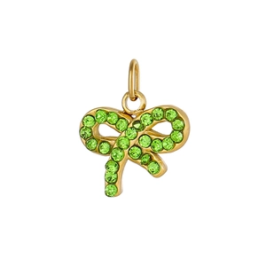 Close-up of a golden bow pendant with sparkling green rhinestones and metal loop