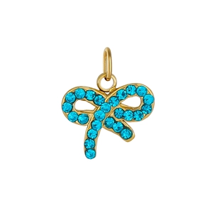 Macro shot of gold and blue bow pendant with sparkling rhinestones and metal loop