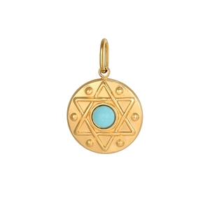 Macro shot of gold octagram pendant featuring turquoise inlay and retro bohemian design