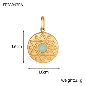 Detailed macro view of gold eight-pointed star pendant with turquoise stone inlay