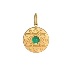 Macro view of a gold stainless steel sun pendant with a green gemstone inlay
