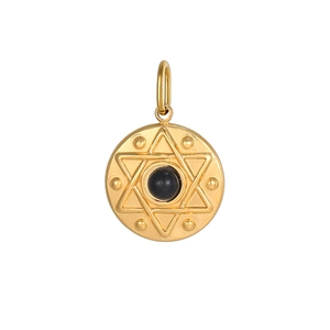 Detailed view of a gold circular pendant featuring a 3D star and black gemstone inlay