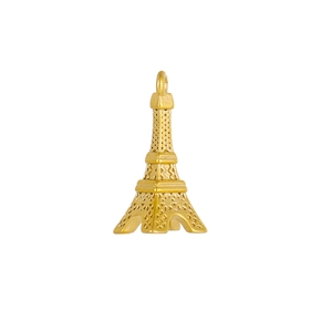 Vista macro dettagliata di un ciondolo Torre Eiffel dorato con motivi geometrici in metallo