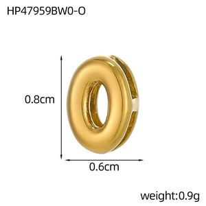 Macro view of 18K gold plated letter O pendant showing 0.8cm height and 0.6cm width