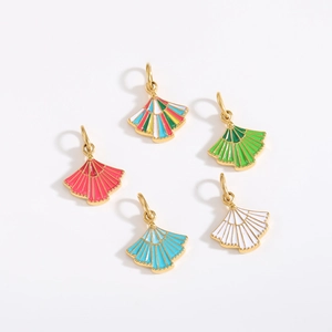 Macro shot of assorted colorful enamel fan-shaped charms with gold-plated metal frames