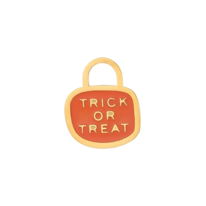 Detail of square orange enamel Halloween charm with gold Trick or Treat text