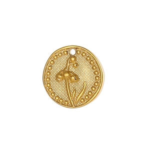 Gold lily of the valley flower pendant in stainless steel with a beaded circular frame