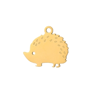 Close-up of golden hedgehog pendant with detailed spine texture and polished finish
