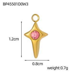 Detailed view of golden north star pendant with pink stone and dimension labels