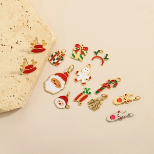 Set di ciondoli fai-da-te natalizi con motivi Babbo Natale, renna e albero in oro