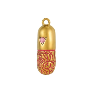 Golden capsule charm pendant with red enamel patterns and pink zircon inlay