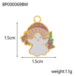 Macro view of mushroom ghost enamel charm with floral details and gold metal outlines