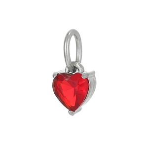 Close-up of a red heart-shaped zircon pendant with polished silver steel mounting
