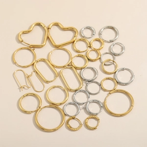 Polished stainless steel earring set in gold and silver with various geometric shapes