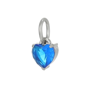 Macro shot of heart-shaped blue zircon pendant with silver prong setting for jewelry DIY