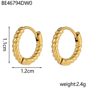 Detail view of gold twisted hoop earrings showing height 1.1cm and width 1.2cm dimensions