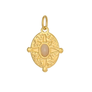 Detail of a vintage oval gold pendant featuring a pink gemstone and star engraving