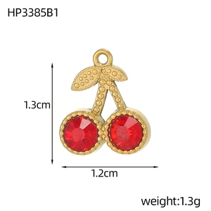 Detailed view of cherry pendant with 1.3cm size dimensions and gold plating
