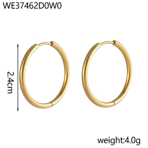 Close-up of polished 18K gold-plated stainless steel hoop earrings with 2.4cm diameter