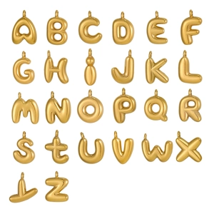 Detailed view of 26 polished golden balloon-style alphabet pendants for jewelry making