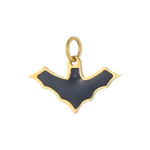 Macro detail of bat-shaped pendant with gold metal edges and black enamel finish