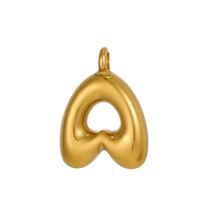 Macro view of polished gold bubble letter A pendant with smooth metallic texture
