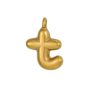 Macro shot of gold bubble letter t pendant with smooth mirror-polished finish