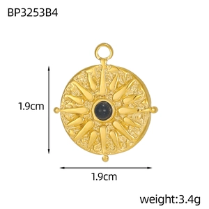 Detailed close-up of a vintage sunburst tarot pendant with zircon and 1.9cm dimensions