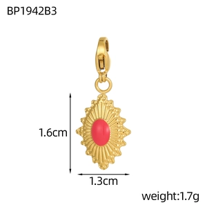 Detail of gold evil eye pendant showing 1.6cm height dimensions and lobster clasp
