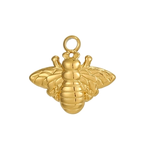 Macro detail of a polished golden bee pendant with intricate wing texture for DIY jewelry